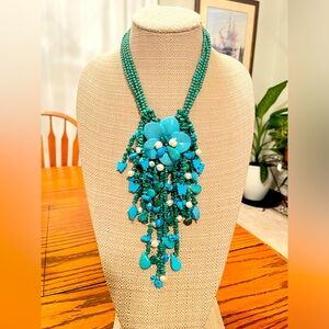 Vintage 1970-1980's turquoise necklace with hand carved flower pendant